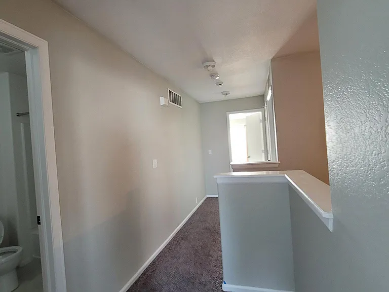 Upstairs hallway between bedrooms