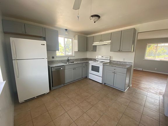 Newly updated kitchen with brand-new dishwasher, cabinets and countertop.