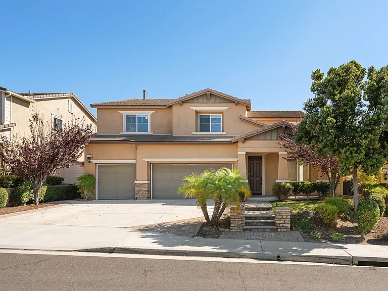 Front of Home View with attached 3 Car Garage