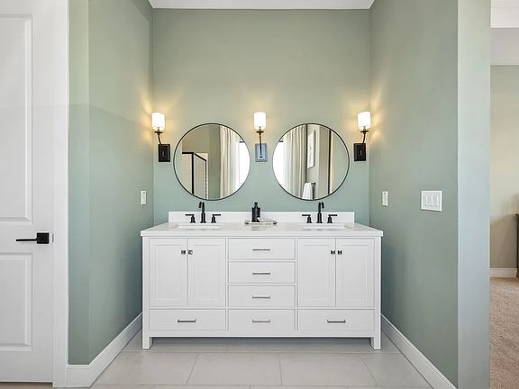 Primary bath with freestanding vanity