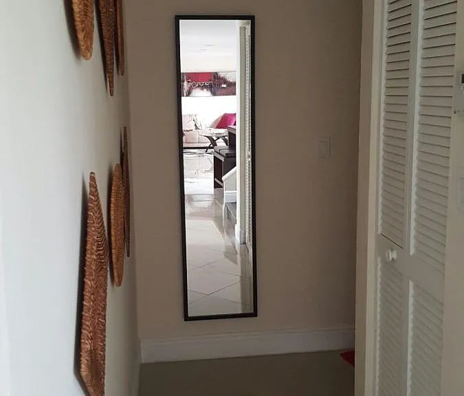 Hallway to garage and 3rd bath