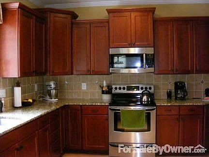 View of kitchen
						:
						Lots of cabinet space!
