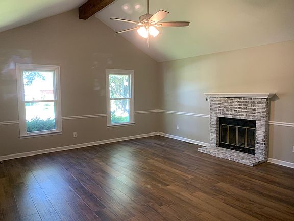 Living room with vaulted ceiling