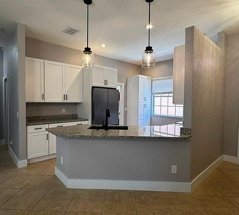 4th image of 8969 Spring Mountain Way