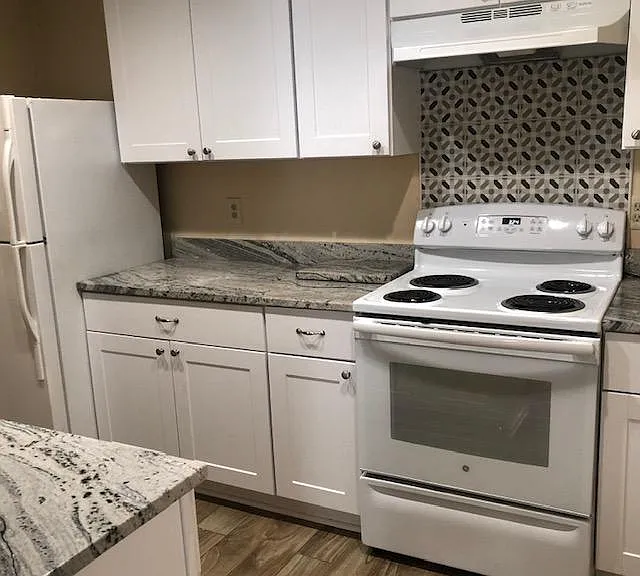 New cabinets, appliances, granite countertops