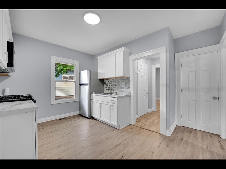 Kitchen New appliances cabinets, and floor