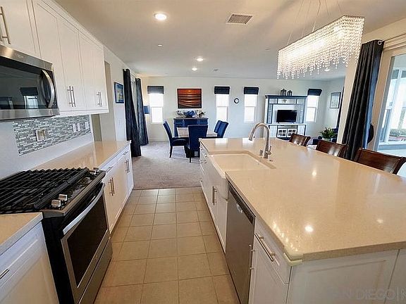 Open living, dining, kitchen