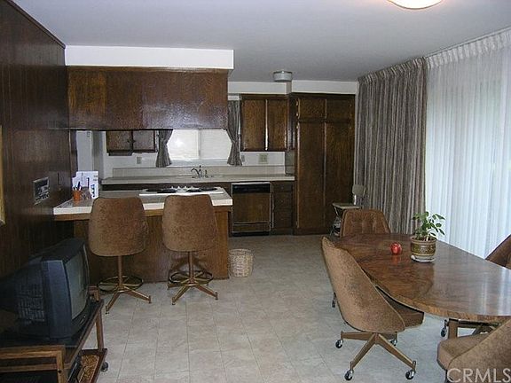 Eating area/family room off the kitchen.  Notice the handy breakfast bar.