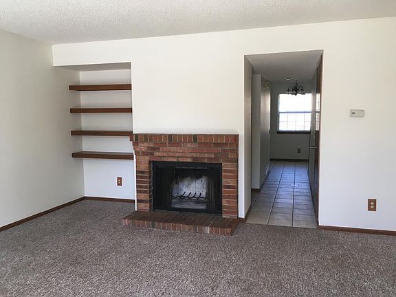 wood burning fireplace in front room
