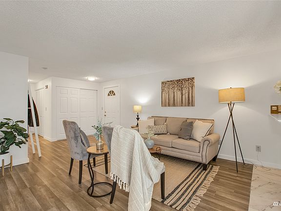 View of the front door, the closet as you come in has the washer & dryer which stays with the home. >