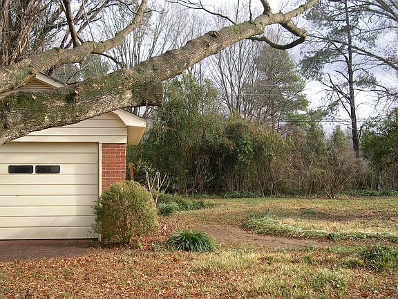 Backyard with garage