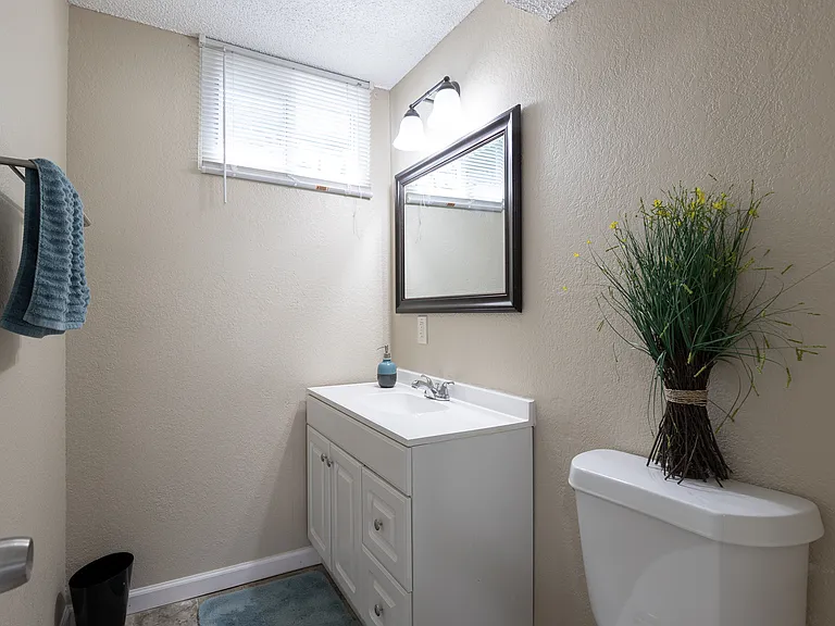 1/2 bath 1st floor garage level