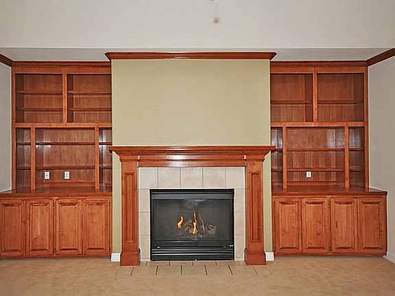 Beautiful built in cabinets and bookshelves plus gas log fireplace