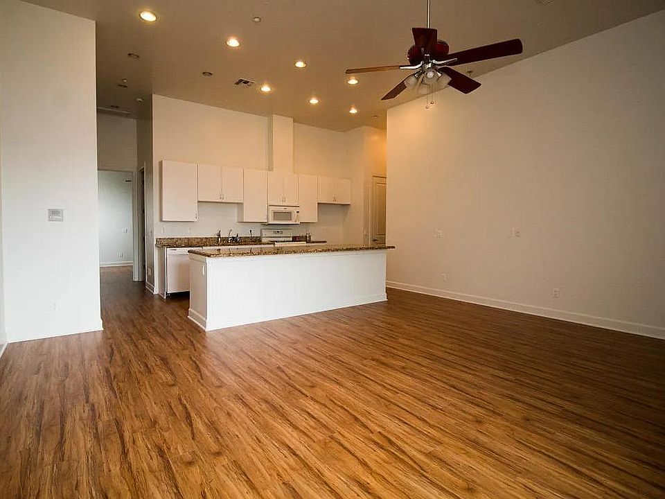 Living room and kitchen feature an open floor plan