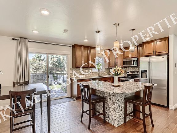 Kitchen with island that opens to a great backyard.