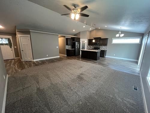 Open concept with vaulted ceiling. Great space of cozy nights or large gatherings