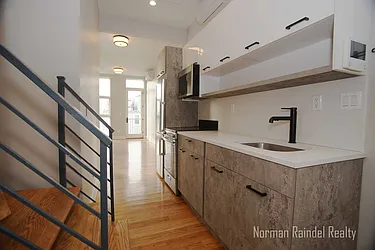 Rented by Norman Raindel, LREB