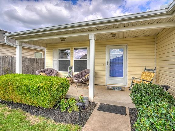 Covered Porch with large patio with room for seating!