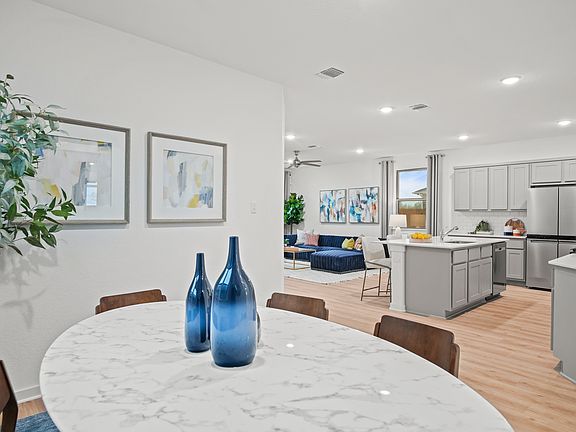 Dining Area in the Oak home plan by Trophy Signature Homes - REPRESENTATIVE PHOTO