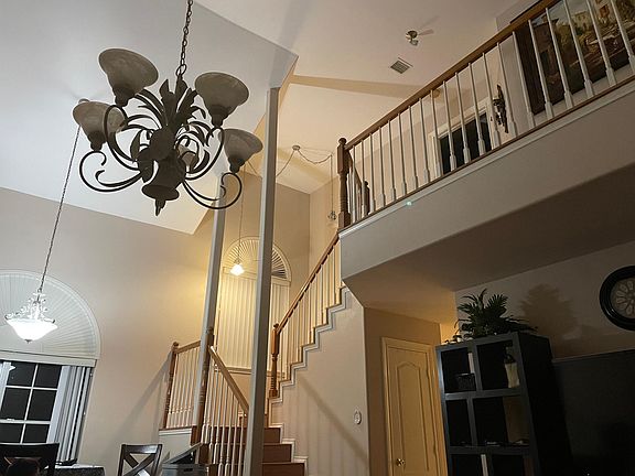 High ceiling living room. Spacious. All wood floors.