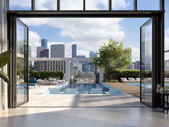 Enjoy a splash in the pool or catch some sun on the deck with city views.