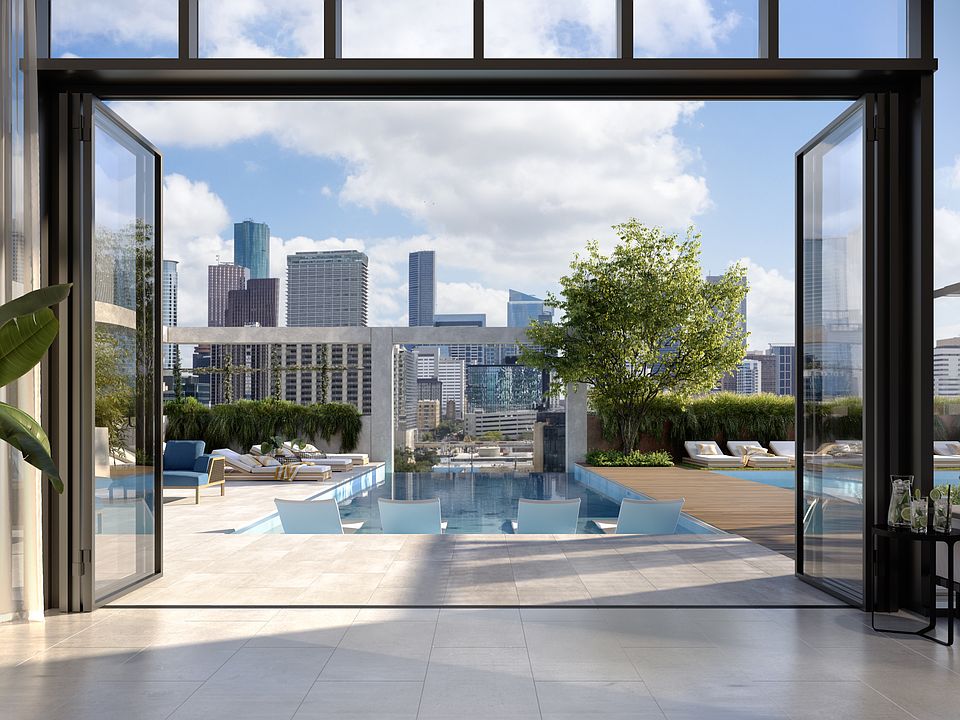 Enjoy a splash in the pool or catch some sun on the deck with city views.