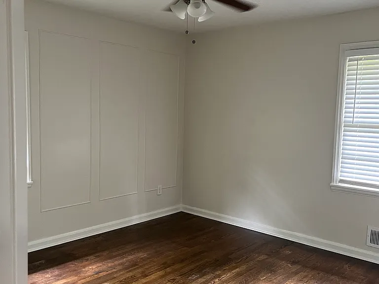 Primary Bedroom with wainscoting