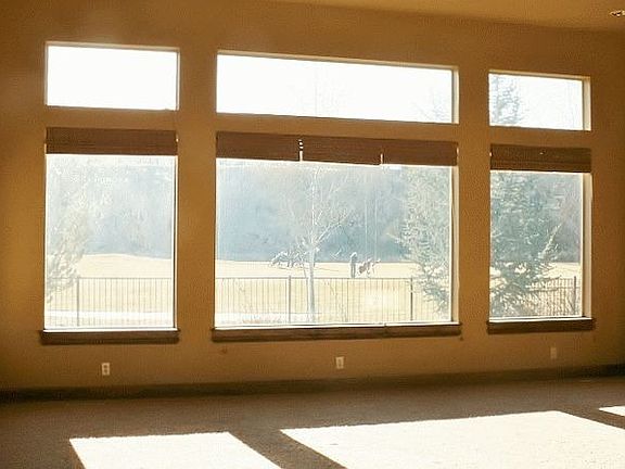 grand room with view of the 5th hole