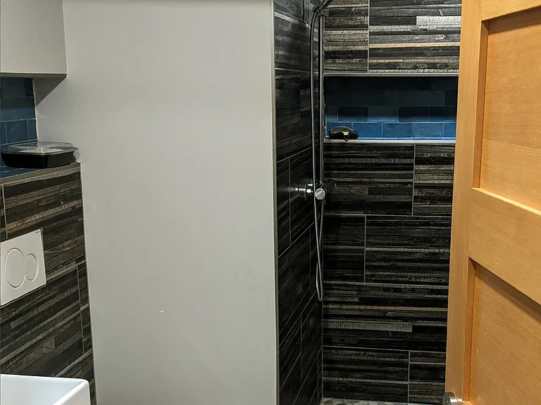 bathroom with rain shower