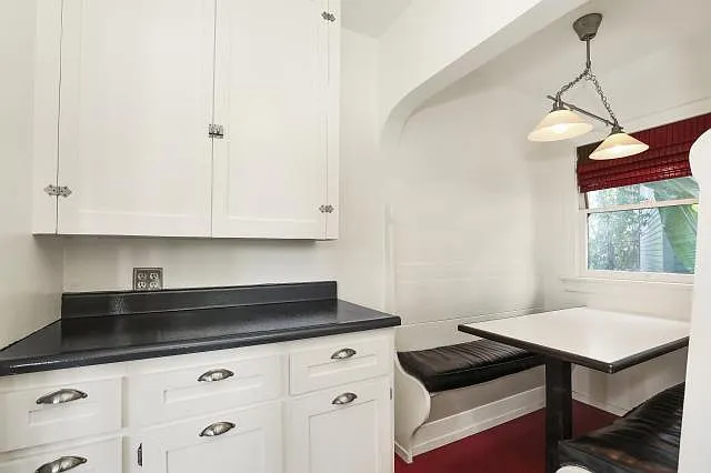 pantry cabinets to left of nook