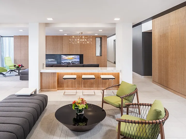 Hotel inspired lobby with mid-century finishes