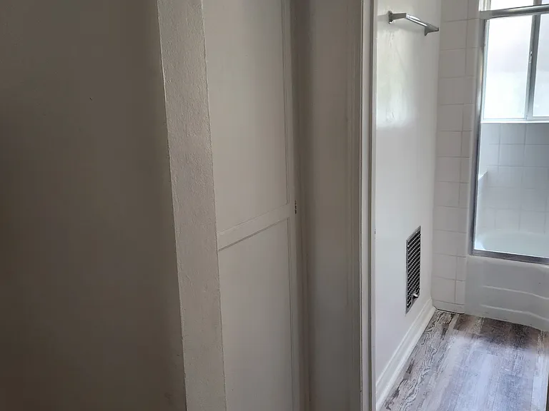 Storage and leading to bathroom