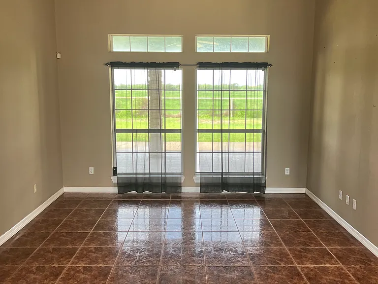 Spacious bonus living area with natural light and flexible setup _ great for entertaining or relaxing with family.