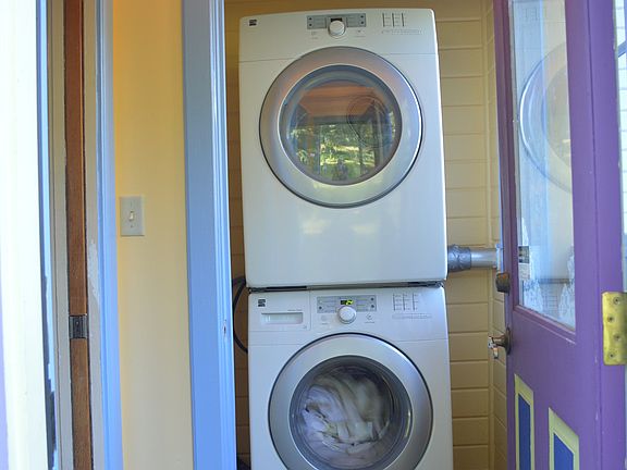 The laundry room, just inside the back door.