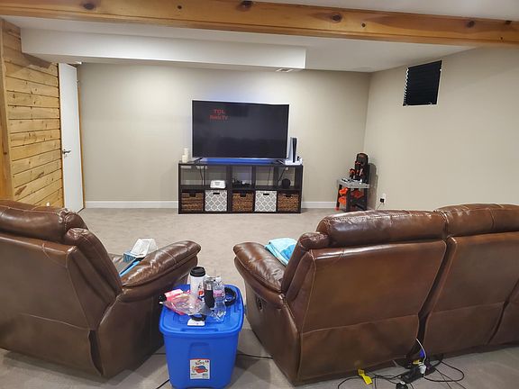 large finished basement with new carpet