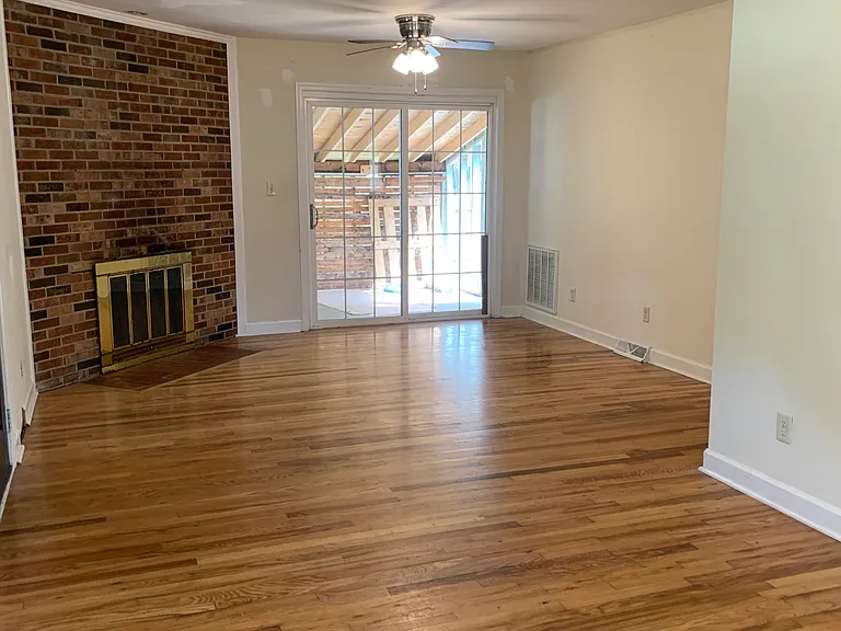 living dining combo with view to covered porch