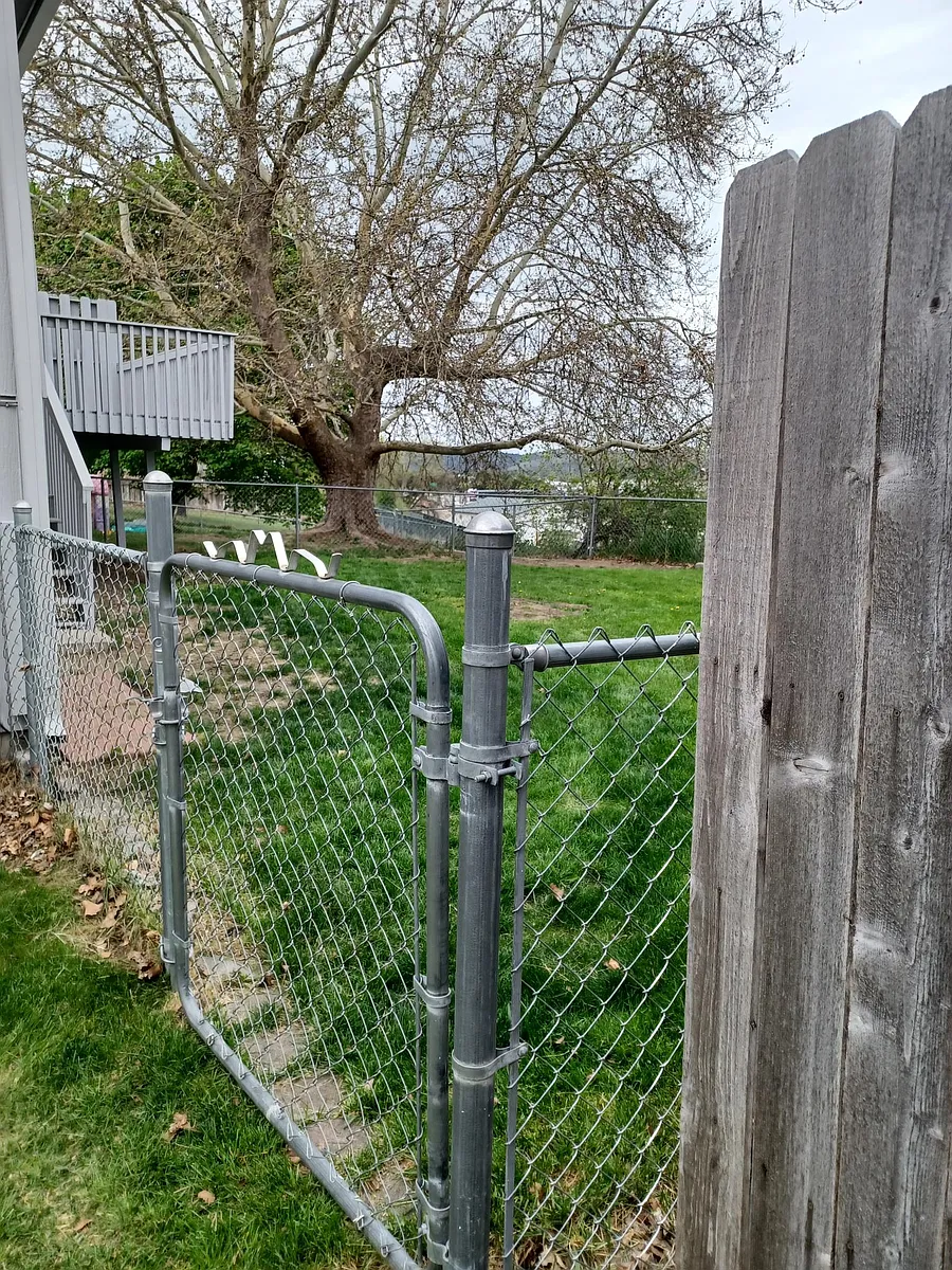 Side gate to enter fenced backyard. - 11011 E Augusta Ave