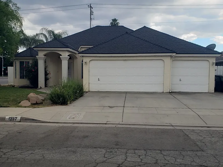 1237 E Athens Ave — Photo 1