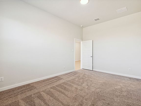 Primary Suite in the Ash home plan by Trophy Signature Homes - REPRESENTATIVE PHOTO