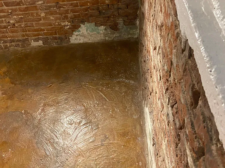 Stairs leading to basement bedroom