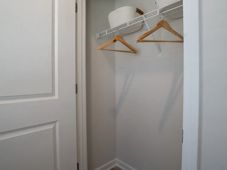 closet in secondary bedroom