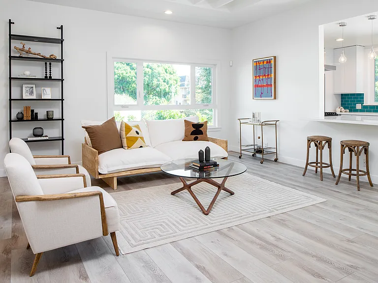 great room off kitchen with peninsula and seating