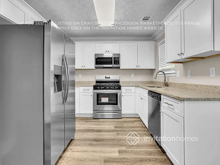 6054 Trailside Cv — Photo 13
