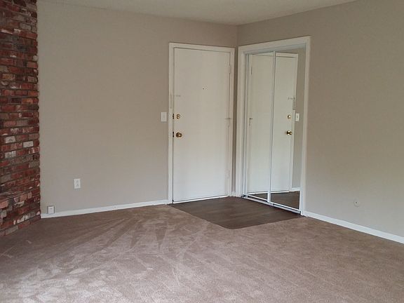 Living Room with Wood Burning Fireplace