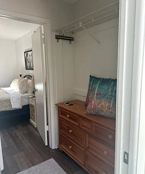 Looking from Master bedroom into large closet and through to master bathroom
