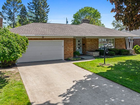 2 car Garage (2 remotes) with wide Driveway