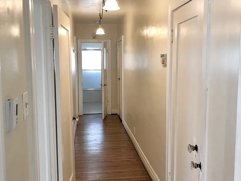 HALLWAY TOE BED AND BATH WITH TONS OF CLOSETS