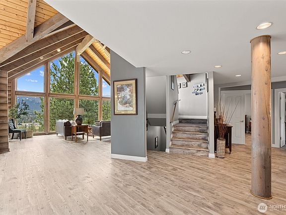 Freshly installed luxury vinyl plank  flooring throughout the home adds both beauty and practicality.>