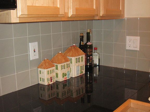 Bright kitchen. Abundance of kitchen cabinets and