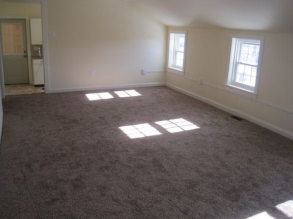 living room 12'8" x 23'6"